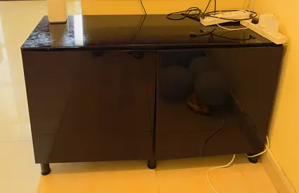 Small black glossy TV cabinet / storage cabinet - good condition