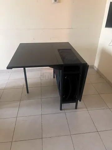 Black compact extendable dining table with 3 nesting chairs - excellent condition