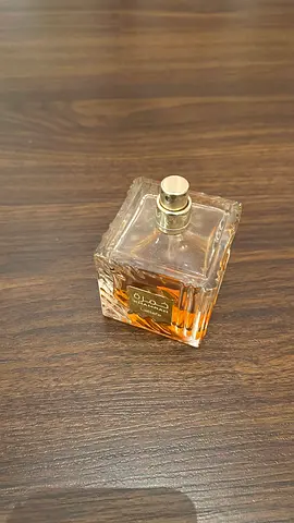 used Lattafa Khamrah fragrance unisex, 50% left, price negotiable, cap missing but w box