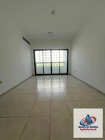 The most beautiful and largest one-bedroom apartment in Al Majaz 2, with a balcony, air conditioning, central gas, and a privacy distributor .