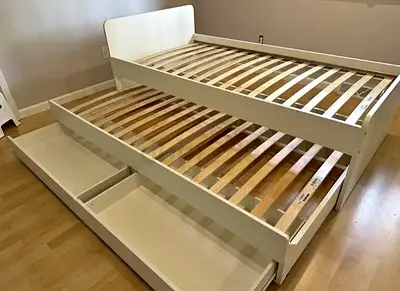 Slakt bed under bed with 2 Ikea mattresses and 2 storage drawers underneath is available