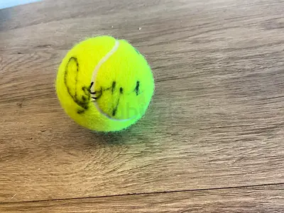 2 mystery tennis players signatures