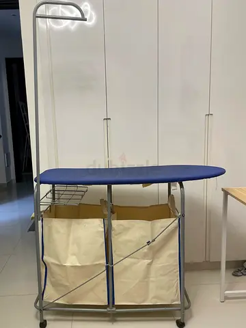 Ironing board with garment hanger and dual laundry bags from Home Centre
