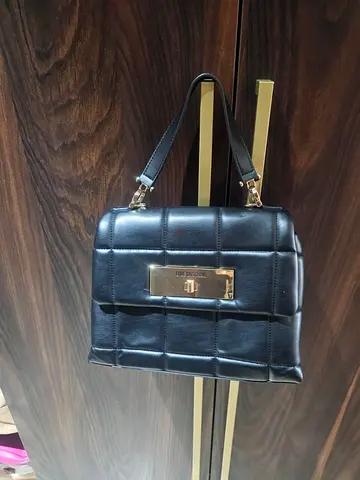 Black Quilted Leather Handbag with Gold Plate