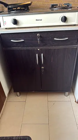 Compact kitchen cabinet with drawer and double doors - dark wood finish