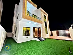 For sale: Modern 4BR villa with a roof , including registration fees. in Al Helio 2, Ajman. Bank fin
