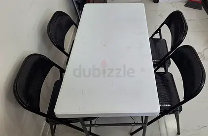 Foldable dining table and chairs(4)