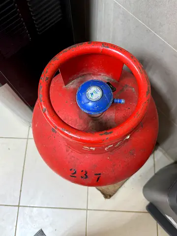 Red LPG Gas Cylinder with regulator and pipe