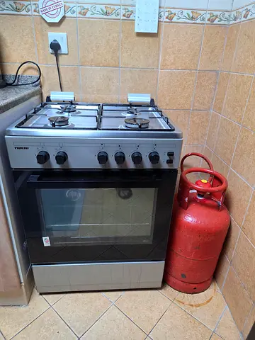 Nikai 4-Burner Gas Cooker with Oven  cylinder— Good Working Condition