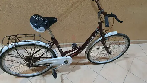 My orange step-through cruiser bike 24 inch - used