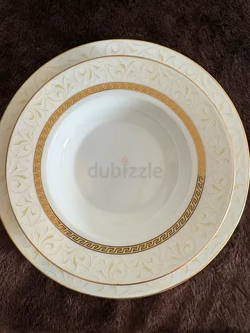 Set of elegant white and gold dinner plates and soup bowls (single shown) 46 pieces
