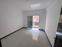 For annual rent in Al Muwaihat 3, Ajman, on the main street: two bedrooms and a living room, balcony