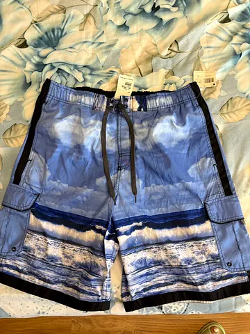 Blue mens swim shorts / board shorts - size tag visible, new