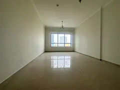 The most luxurious two-bedroom apartment in Al Majaz 2, near Al Wahda Street. It features a master b