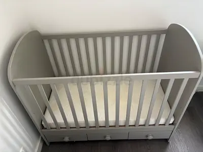 Baby cot with drawers