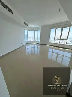 Luxurious four-bedroom apartment with a living room for annual rent in Al Majaz 2, Sharjah | 2 livin