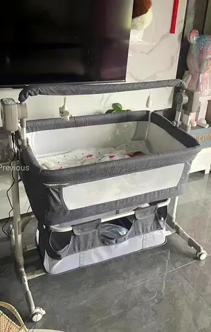 Gray Adjustable Baby Bassinet with Storage and Wheels