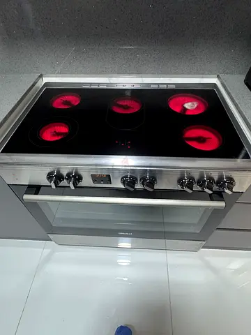 Used less than 1 year. Built-in Electric Ceramic Hob and Oven Combo - Good Working Condition