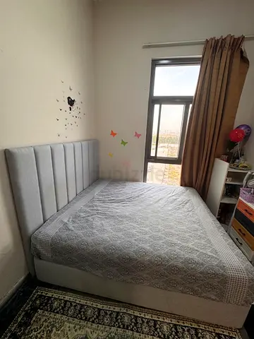 King bed with medical high-quality mattress and upholstered headboard - excellent condition.
