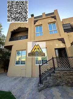 A villa for annual rent in Al Muwaihat 3, Ajman, featuring a modern design and comfortable spaces su