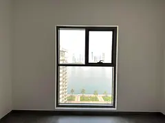 Luxury 4-bedroom apartment in Al Majaz, brand new, first occupancy. Two master bedrooms with sea vie