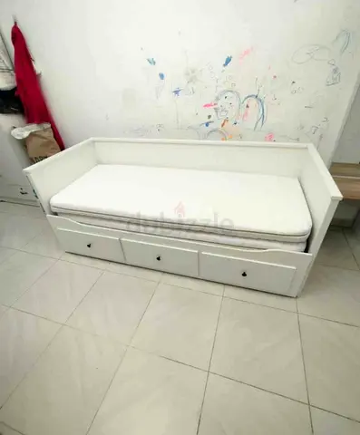 IKEA hamnes day bed with 3 big storage drawers underneath and with 2 IKEA mattresses is available