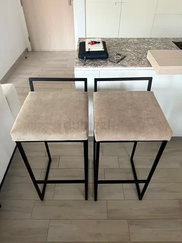 WS LIVING 2 modern bar stools with beige fabric seats and black metal frames