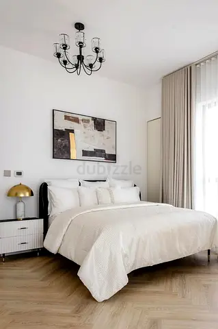 Queen bed with bedside table