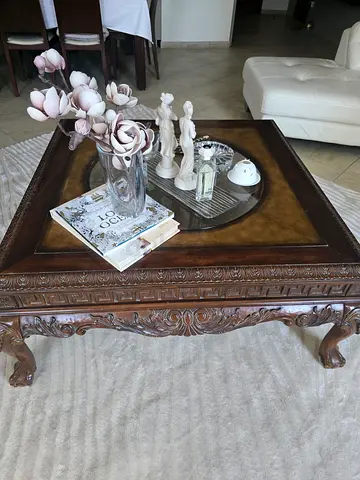 3 piece set: 1 classic wooden center table with a glass on top with 2 matching side coffee tables