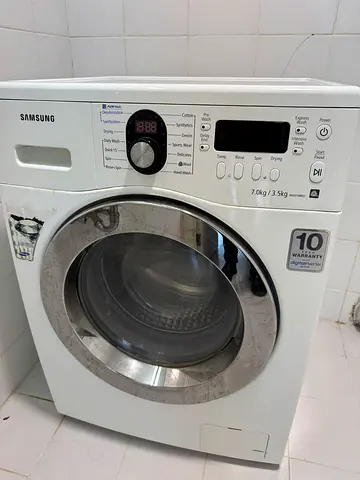 Samsung front load washing machine and dryer 7kg/3.5Kg, in good working condition