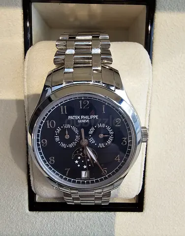 Patek Philippe mens stainless steel automatic watch with moonphase
