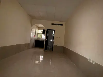 استوديو مميز مطبخ منفصل في الجرف 2 موقع حيوي قريب المحكمة وجامعة عجمان مساحة كبيرة وإطلالة ممتازة تكييف مركزي 20000