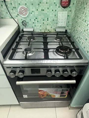 Stainless Steel 4-Burner Gas Cooker with Oven - Good Condition