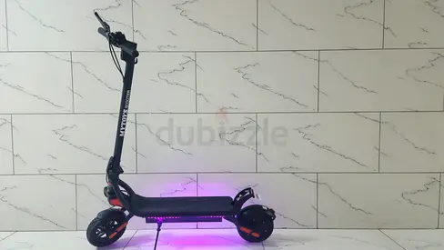 Electric Scooter in Excellent Condition with RGB Lights and Suspensions with many Features