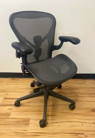 Herman Miller Aeron Remastered Chair in Size B, Graphite, is a modern marvel designed for optimal co