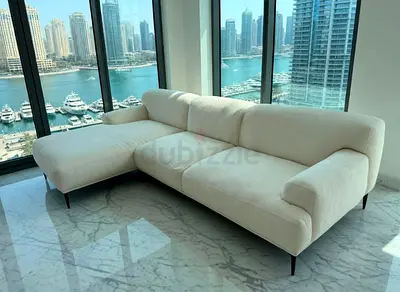 Great Condition The loom collection L shape feather filled sofa