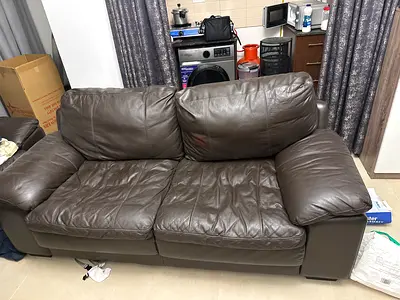 2-Seater Brown Leather Sofa — Used, Good Condition