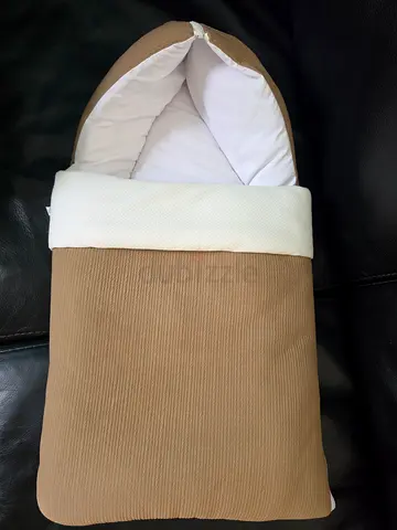 Portable baby nest / bassinet footmuff - beige, gently used