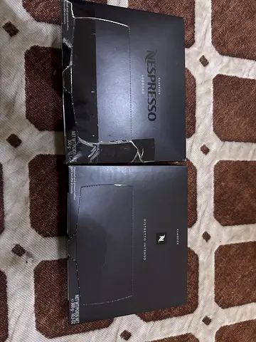 Two boxes of Nespresso coffee capsules (Leggero  Ristretto Intenso) — unopened