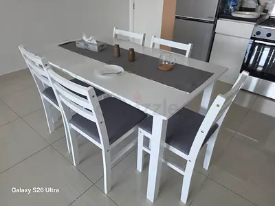 White 6-Seater Wooden Dining Table with Cushioned Chairs