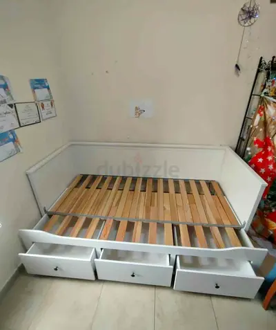 IKEA hamnes day bed with 3 big storage drawers underneath and with 2 IKEA mattresses is available