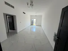 Two-bedroom apartment with a living room - Al Jurf 3, Ajman - Central air conditioning - Family acco