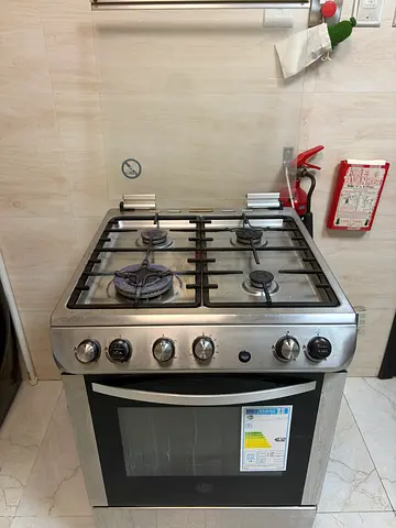 Used Stainless Steel 4-Burner Gas Cooker with Oven - Good Working Condition