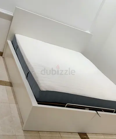 Ikea Hydraulic King size bed with mattress available in perfect condition
