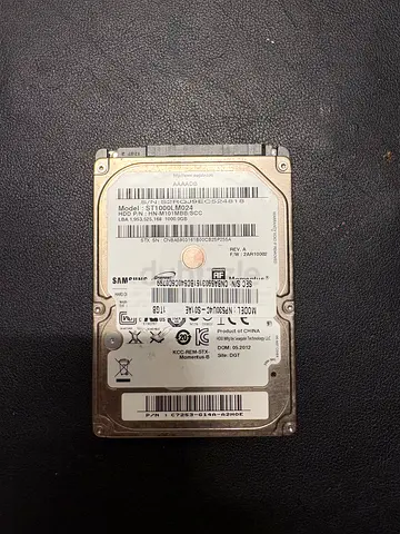 1TB portable hard drive Seagate + USB adapter enclosure