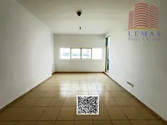 One bedroom and living room with a garden view and open kitchen.