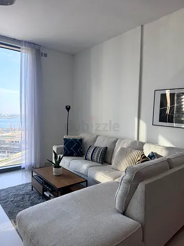 Beige L-shaped sofa with chaise