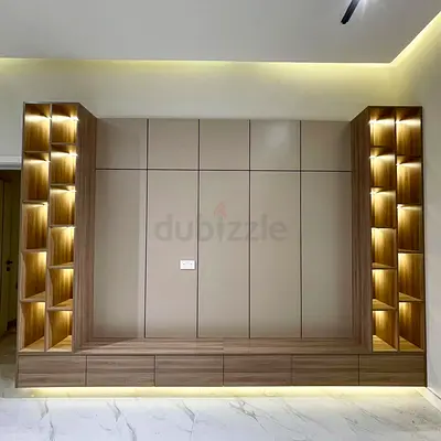 Custom Built-in Entertainment Wall Unit with LED Shelving