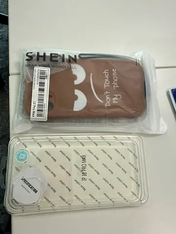 Two iPhone 11 Pro Max Protective Cases (Brown Silicone + Clear)