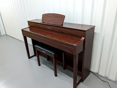 Yamaha Clavinova CLP535 mahagony color With piano bench. As good as new. Free Delivery with warranty